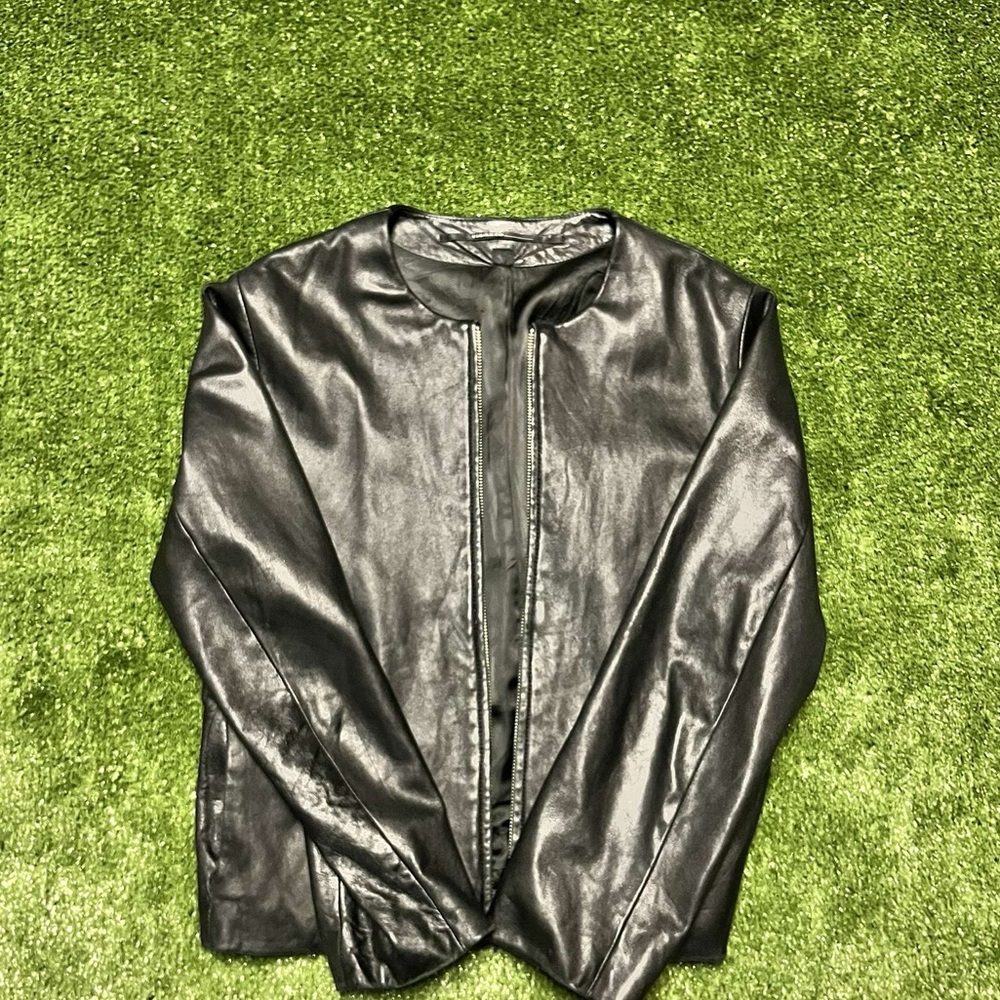 Black leather jacket, in great condition. Size medium